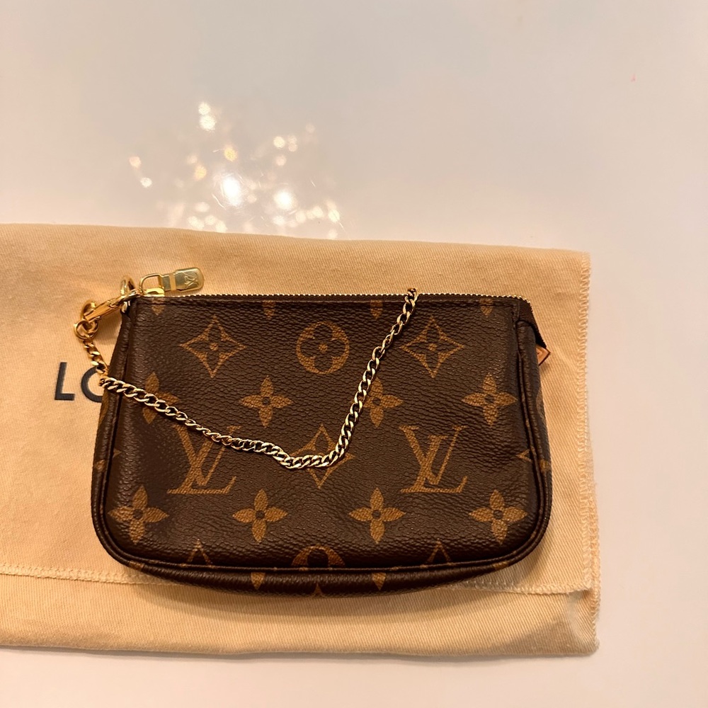 Mini pochette accessoires in monogram canvas